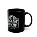 Bigfoot and Bunyip Black Coffee Mug — Novelty Cryptid Design (11oz/15oz)